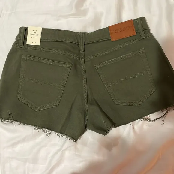 NWT Lucky Brand Cut Off Jean Shorts in Classic Green Distressed size 8/29