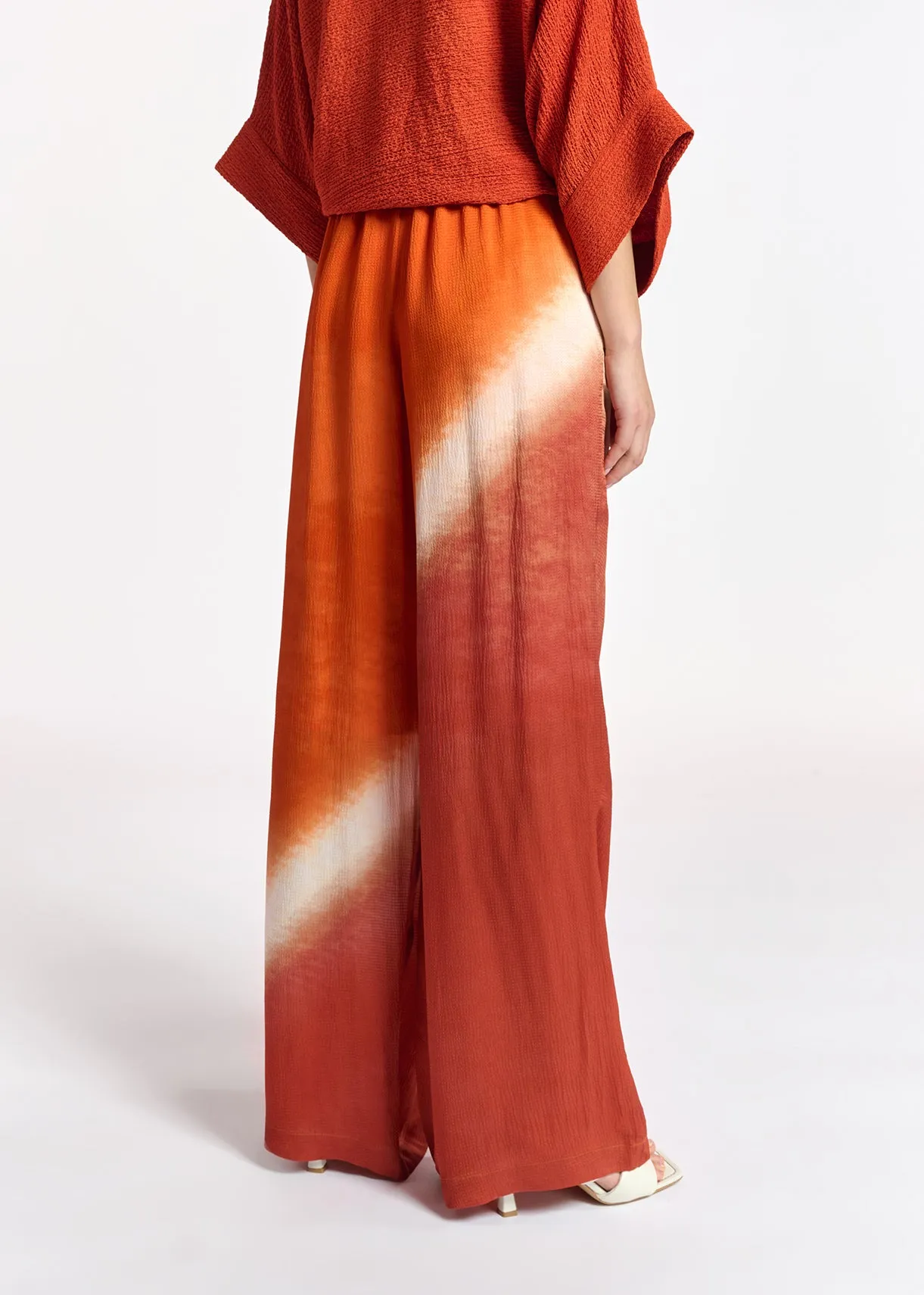 Orange wide-leg tie-dye pants