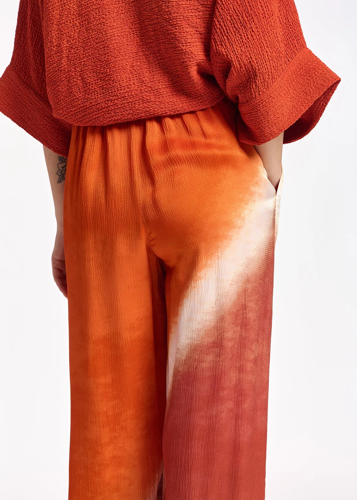 Orange wide-leg tie-dye pants