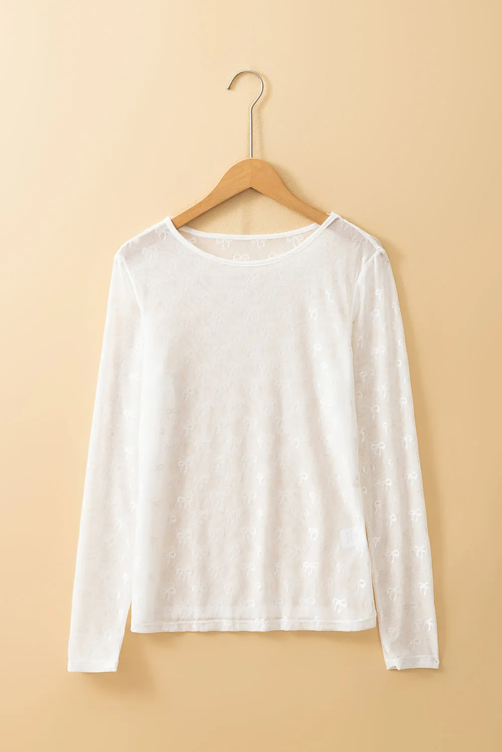 Sheer Bow Pattern Mesh Long Sleeve Top